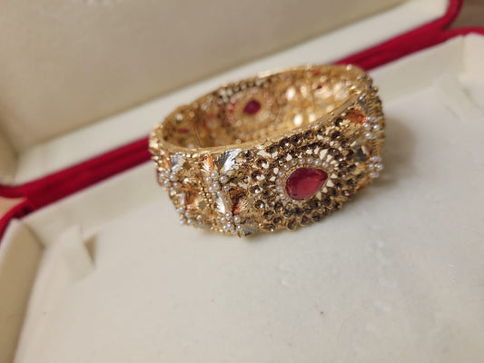 Imported Antique Indian Gold-Plated Bracelet with Red Teardrop Stones and Pearls for Bridal Elegance